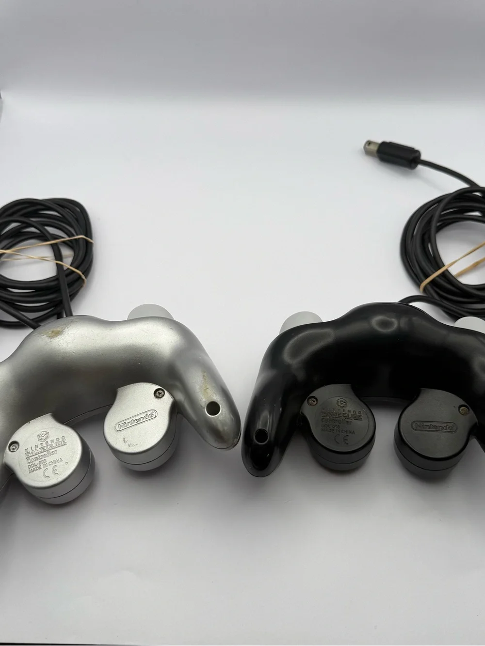 Lot of 2 OEM Gamecube Controllers - Pair Of Silver & Black Tested Original